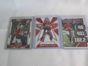 lot 149 image: Assorted Tom Brady Cards...