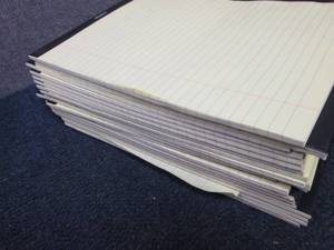 lot 429 image: Stack of Staples Yellow Legal Pads...