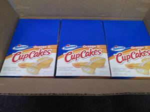 lot 570 image: 3- 20.3 oz Hostess Orange Cupcakes...