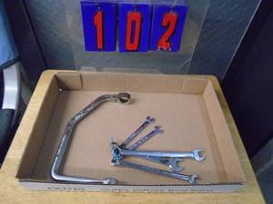 Snap On one specialty wrench & small standard combo wrenches. As shown.