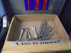 Flat of combo & box end wrenches. As shown.
