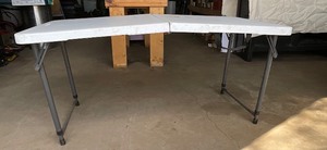lot 125 image: Small Plastic Fold Up Table With Adjustable Legs