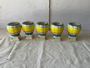 lot 311 image: Ceramic hot air balloon planters