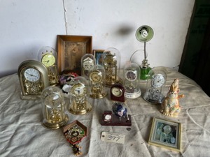 lot 397 image: 13 Bubble Clocks, 2 Jesus Pictures, Small Lamp