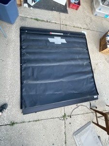 lot 398 image: Chevy 6 Tonneau Cover wBrackets