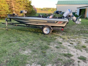 lot 739 image: 1989 Nissan Boat, Motor & Trailer Package