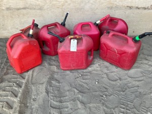 lot 703 image: 7 - 5 gal gas cans