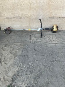 lot 708 image: Gas Trimmer Pulls over