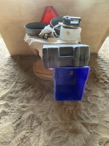 lot 724 image: Oil Pans, Slow-moving sign, Wire Fence insulators, Wagner power Roller, Case- Tote