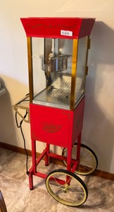 lot 462 image: Movie Time Popcorn Machine on Wheels, Nostalgia Electronics