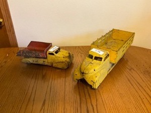 lot 474 image: 2 Vintage Trucks Metal Sand & Gravel Dump Truck Cattle Truck Wheels are nice