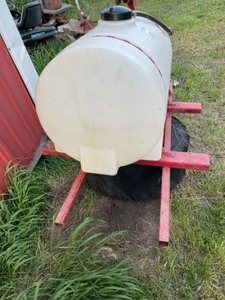 lot 655 image: 65 Gallon Poly Tank and Rack