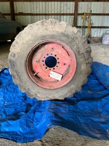 lot 608 image: Skid Loader Wheel & Tire  Firestone 10-16.5 6 ply