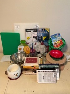 lot 587 image: Bin of Misc Cutting Boards, Books, Topsy Terry Gardening