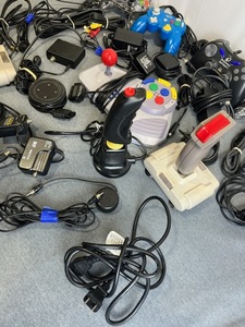 lot 24 image: Vintage Video Game Controllers, Power Adapters, Cables, and Accessories