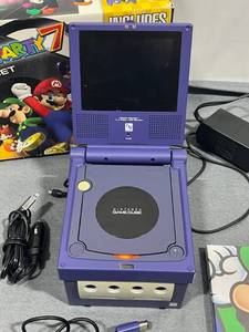 lot 72 image: Nintendo Game Cube, Controller, 5.4 Color LCD Screen, TMNT Games, and More