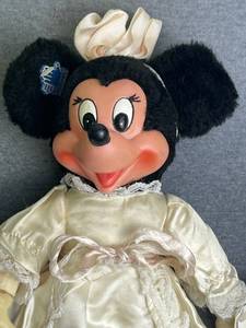 lot 111 image: Vintage Disney Applause Minnie Mouse 10 Vinyl Plush Wedding Bride Doll, Vintage Rainbow Brite Plush Dolls, and 7up Reversible Spot & Basketball Hang-up Plush