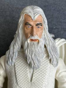lot 128 image: 12 Lord Of The Rings Gandalf White Vinyl Action Figure (2005 NLP, Inc.)
