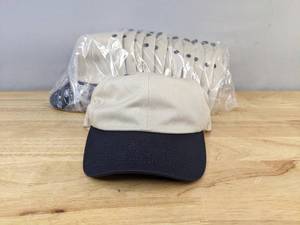 lot 122A image: 12 Brand New Advantage Series LTD Stone and Navy Hats OSFM  A