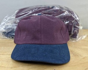 lot 504 image: 12 Brand New Yupoong Slide-Back Plum and Navy Hats One Size Fits Most A