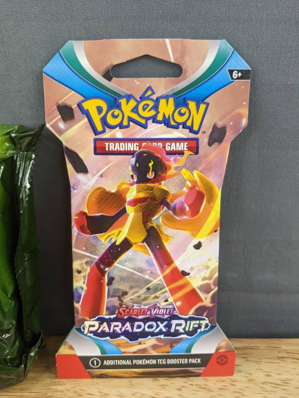 lot 31 image: Brand New Pokemon Trading Cards Trick or Treat Booster Bundle and Scarlet & Violet Paradox Rift (2) I