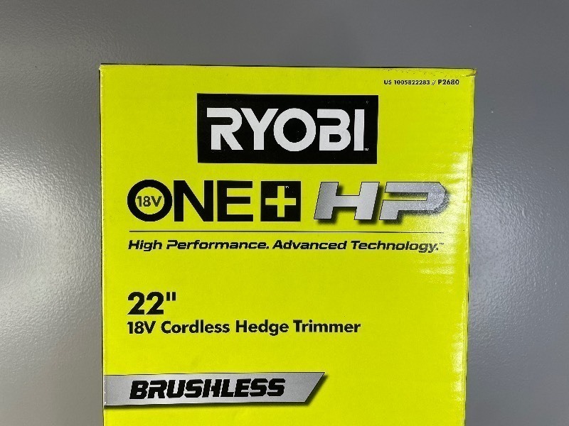 lot 20A image: Brand New Ryobi ONE HP 18V Brushless 22 in. Cordless Battery Hedge Trimmer with 2.0 Ah Battery and Charger $199 Retail N