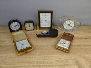 lot 115 image: (7) Assorted Small Analog Clocks - Folding Travel Alarm Clocks, Table Clocks, and more E