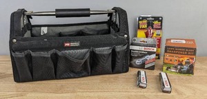 lot 97 image: New Bosch Double Iridium OE Fine Wire Spark Plugs, Lawn Mower Blade Sharpener Kit, The Original Automatic Transmission Shudder Eliminator and McGuire Nicholas Tool Bag C