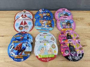 lot 45 image: (12) Brand New Scented Bath Bomb Crumbles Spiderman, Elf on a Shelf, Paw Patrol, Cocomelon, That Girl, LOL Surprise N