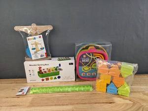 lot 73 image: New Assorted Kids Toys Collapsible Buckets, Wooden Shape Sorting Box, Wooden Scale, Pop Fidget Ruler and More F