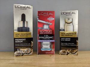 lot 68B image: Brand New LOreal Paris Beauty Products Age Perfect Cell Renewal Midnight Serum, Age Perfect Anti-Aging Eye Cream, and Revitalift Hyaluronic Acid Caffeine Serum Retail $59.88 O