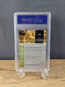 lot 22 image: Tiger Woods 2001 Upper Deck Golf WCG Graded 10 Rookie Tigers Tales Card #TT20 V
