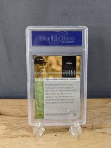 lot 38 image: Tiger Woods 2001 Upper Deck Golf WCG Graded 10 Rookie Tigers Tales Card #TT30 V