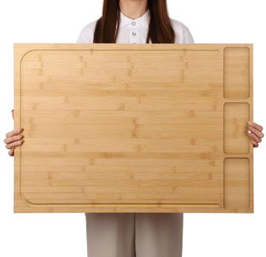 lot 141 image: Extra Large Bamboo Cutting Board and Stovetop Cover, Stove Top Cover Chopping Board with Detachable Legs and Juice Groove