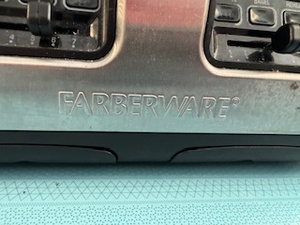 lot 28 image: Farberware Four Slot Toaster and George Foreman Grilling Machine