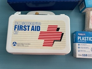 lot 30 image: First Aid Storage Boxes with Contents and No Touch Infrared Thermometer - appears new