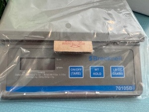 lot 42 image: Brecknell Scale (appears unused) and Office Supplies