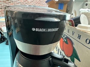 lot 65 image: Black & Decker 12 Cup Coffee Pot, Coffee and Coffee Supplies including Starbucks Decaf Coffee