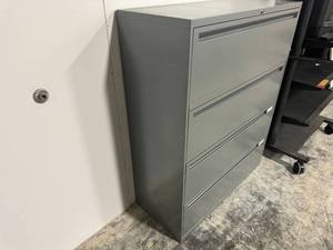 lot 99 image: Gray Four Drawer File Cabinet