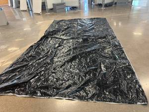 lot 116 image: Plastic Drop Cloth. 18.5 x 10