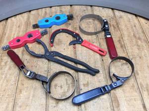 lot 121 image: Automotive Oil Filter Wrenches - Battery Brushes