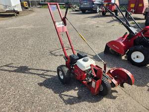 lot 14 image: Brown Edgemaster Honda GX120 4.0 Edger E-104H