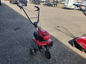 lot 24 image: Honda Gas Tiller F220