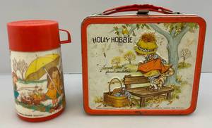 lot 41 image: Vintage Embossed Holly Hobbie Metal Aladdin Lunch Box (With Thermos)