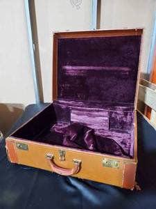 lot 103 image: Vintage Suitcase with Purple Velvet Lining