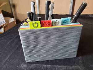lot 137 image: Decorative Knife and Cutting Board Set