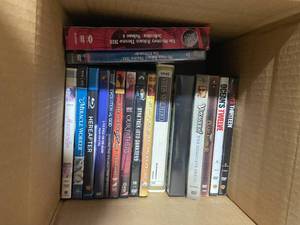 lot 60 image: Assorted DVD Movie Collection with VHS Classics