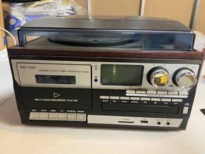 lot 74 image: Retro Audio Multi-Function Audio System with Turntable, Cassette, and CD Player