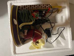 lot 88 image: Thomas Kinkade The true Meaning of Christmas Illuminated Figurine