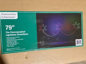 lot 93 image: Hammacher Schlemmer 79 Choreographed Lightshow Snowflakes